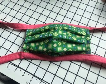 Adult Green with pink ties print 4 layer cotton with filter pocket. Hand made (Filter not included) face mask washable