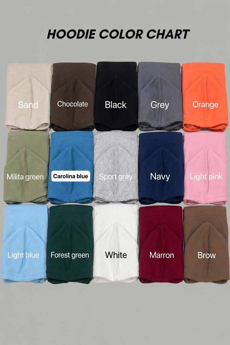 May include: A hoodie color chart displaying fifteen folded hoodies in various colors including sand, chocolate, black, grey, orange, military green, Carolina blue, sport grey, navy, light pink, light blue, forest green, white, maroon, and brown.