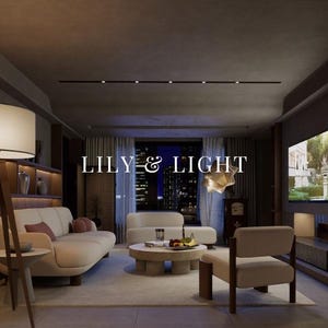 May include: A modern living room with a white couch, a coffee table, and a chair. The room has a large window with a view of a city skyline at night. The text "LILY & LIGHT" is displayed on the wall.