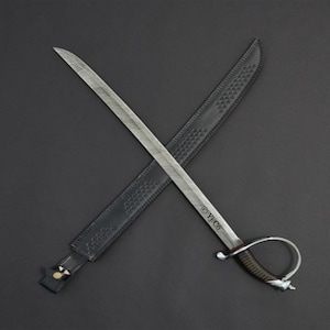 May include: A silver-bladed sword with a curved handle and a black leather sheath, set against a dark gray background. The sword is crossed over the sheath. The handle has a dark brown grip.