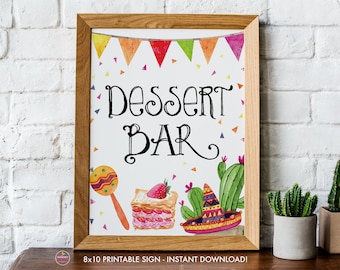 May include: A framed sign with the words "Dessert Bar" in black script. The sign features watercolor illustrations of a maraca, a slice of cake with a strawberry, a cactus, and a sombrero. A banner of colorful triangles is at the top.
