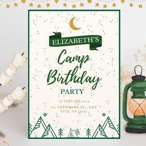 May include: A green and white printable invitation for a camp-themed birthday party. The invitation features a green banner with the text "Elizabeth's Camp Birthday Party" and a crescent moon with a star. The invitation also includes a date, address, and a graphic of a tent and mountains.