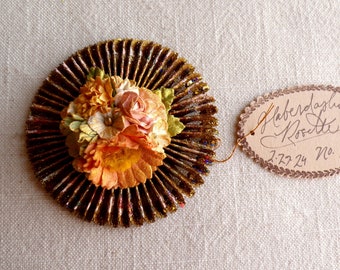 Apricot green white pink yellow handcrafted millinery flowers gold glittered metallic rosette ornament
