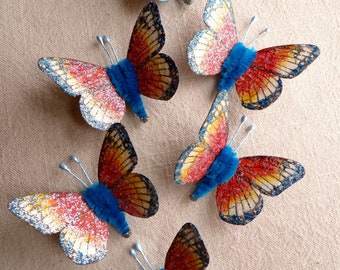 Ultramarine blue yellow red white Watercolor embellishments - sparkly butterflies vintage style pipe cleaner ornaments