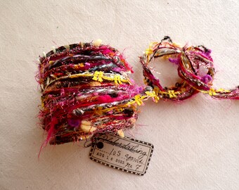 Carnival Spool no. 7 - magenta pink yellow blue mix tinsel tassel yarn trim