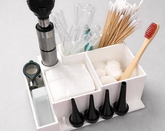 Porte-outil pour otoscope et bac de rangement pour fournitures d'examen de l'oreille