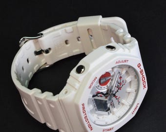 G-SHOCK GA2100 ホワイト/クリア カスタムレイボー塗装 G-SHOCK、ガラス全面が七色に光る“レインボー蒸着”の3機種 - Impress Watch