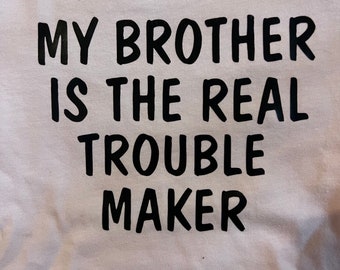 Pink toddler t-shirt 2T- “my brother is the real trouble maker”