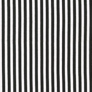 May include: Black and white striped fabric with thin stripes.