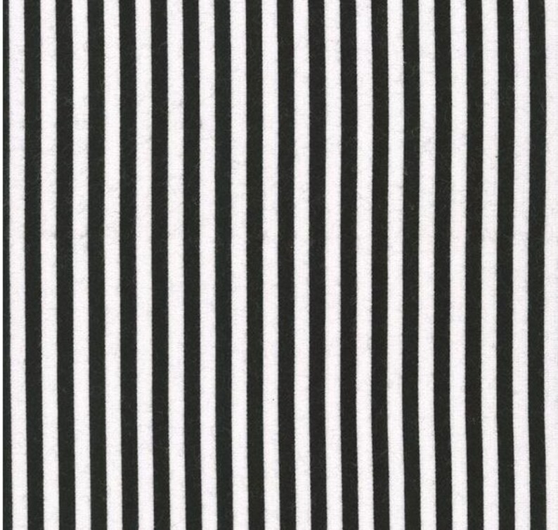 May include: Black and white striped fabric with thin stripes.