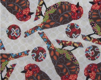 100 percent cotton fabric Beautiful birds on ivory background. Quantity 1= fat quarter. Greater than 1 is a continuous cut.