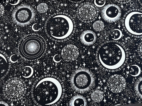 100 percent cotton fabric, glow in the dark, moons and stars all over.