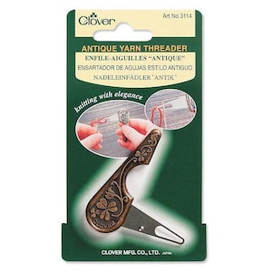 Clover Yarn Threader, metal with antique gold finish.