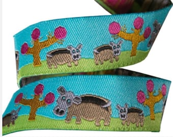 5/8-inch woven jacquard ribbon, hippo on turquoise background