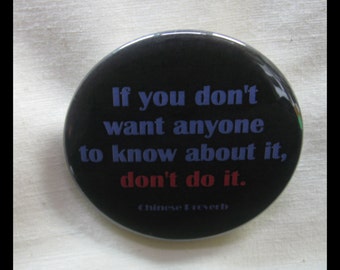 One 2 1/4" pinback button Good Advice