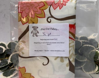 A single 3/4-yard precut of 100 percent cotton fabric large birds and flowers on ivory background.