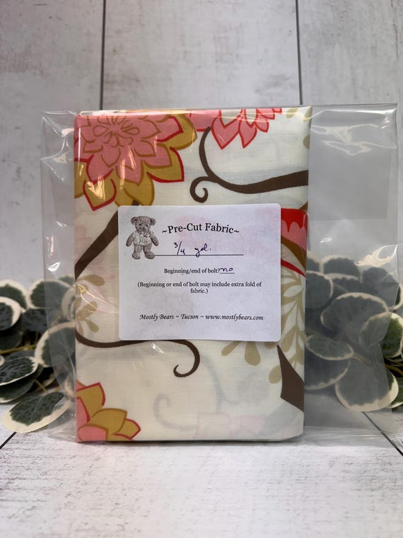 A single 3/4-yard precut of 100 percent cotton fabric large birds and flowers on ivory background.