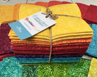 100 percent cotton fabric, package of 24 Fat Quarters, Batik designs, rainbow theme.