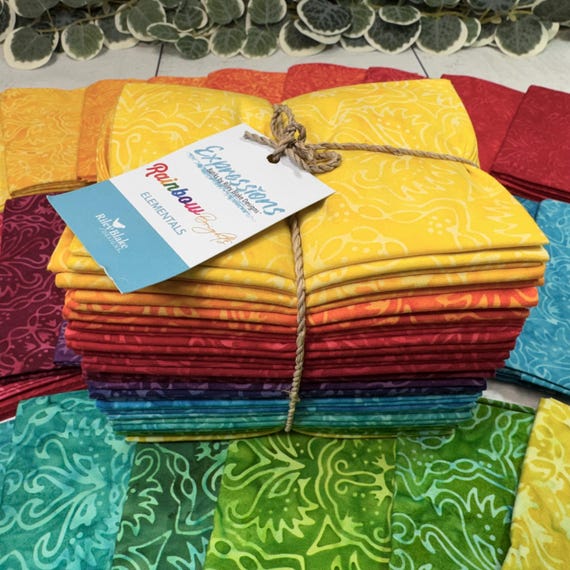 100 percent cotton fabric, package of 24 Fat Quarters, Batik designs, rainbow theme.