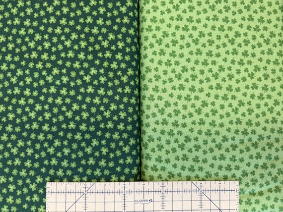 100 percent cotton fabric green shamrocks, choose light or dark green. Quantity 1= fat quarter. Greater than 1 is a continuous cut.
