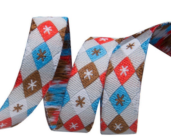 3/8-inch woven jacquard ribbon, argyle and stars on grey background.