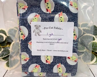 A 1-yard precut of 100 percent cotton fabric Baby Yoda.