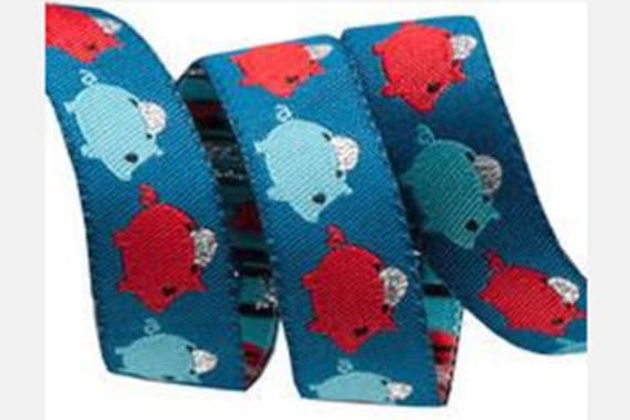 5/8-inch woven jacquard ribbon, Piggy Banks on Blue Background, designed by Jessica Jones