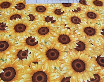 100 percent cotton fabric sunflowers all over. Quantity 1= fat quarter. Greater than 1 is a continuous cut.