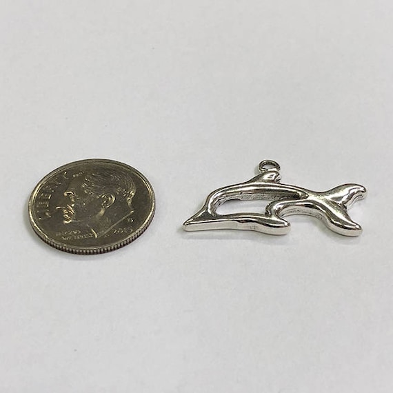 Sterling Silver dolphin, perfect for many artistic creations!