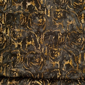 100% Cotton Fabric, batik, Earth Bears, black. Quantity 1= fat quarter. Greater than 1 is a continuous cut.