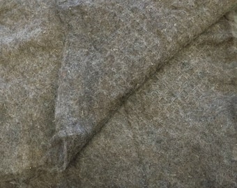 A 36 x 42" piece of 100% alpaca thick felt batting, machine felted in cottage spinnery, many uses!