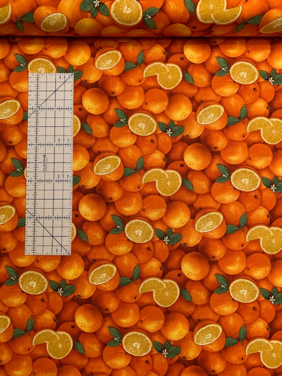 Gorgeous 100 percent cotton fabric with oranges all over. Quantity 1= fat quarter. Greater than 1 is a continuous cut.