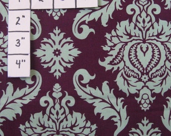 100 percent cotton fabric Purple and Mint Green Design. Quantity 1= fat quarter. Greater than 1 is a continuous cut.