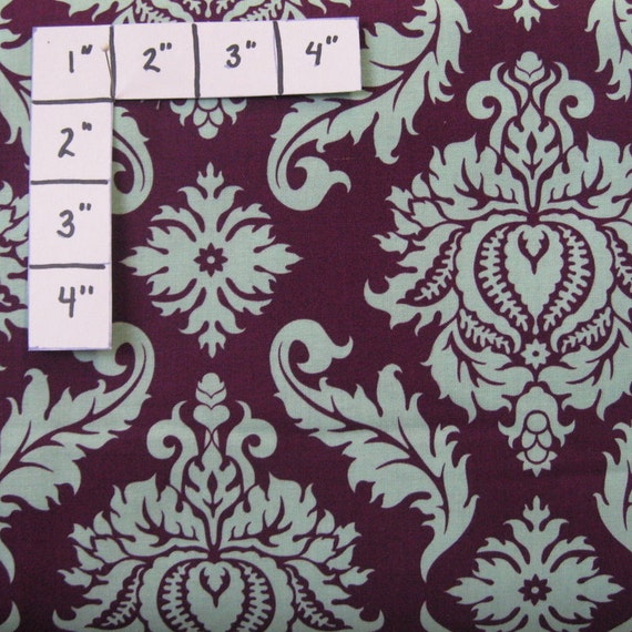 100 percent cotton fabric Purple and Mint Green Design. Quantity 1= fat quarter. Greater than 1 is a continuous cut.