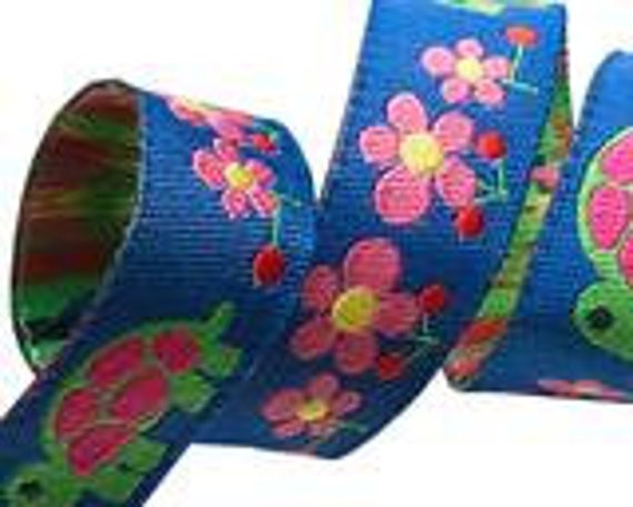 5/8-inch woven jacquard ribbon, tortoise on blue background