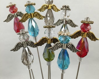 Make your own decorative stickpin or hatpin. Pretty angel in your choice of colors.