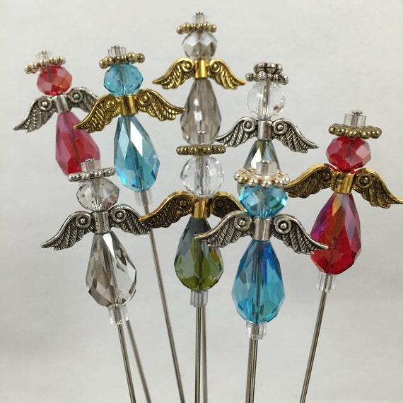Make your own decorative stickpin or hatpin. Pretty angel in your choice of colors.