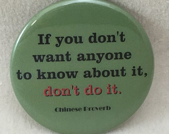 One 2 1/4" pinback button Good Advice