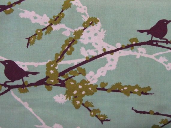 100 percent cotton fabric Mint Green with purple birds, olive accents. Quantity 1= fat quarter. Greater than 1 is a continuous cut.