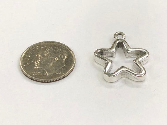 Sterling Silver star charm, perfect for many artistic creations!