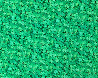 100 percent cotton fabric shamrocks. Quantity 1= fat quarter. Greater than 1 is a continuous cut.