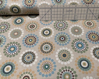 100 percent cotton fabric Beige with multicolor circles. Quantity 1= fat quarter. Greater than 1 is a continuous cut.