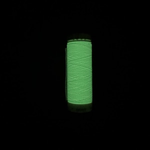 Mettler glow in the dark sewing and embroidery thread.