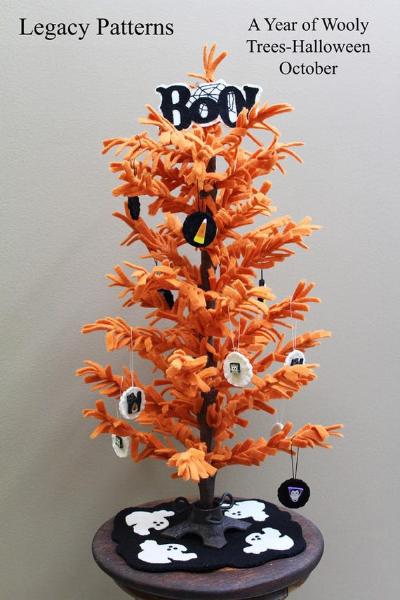 Pattern for wooly feather tree, includes polymer clay buttons & wooden base. Free 1/2 yard of craft felt with purchase.