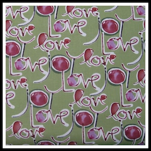 100 percent cotton fabric Love, sage green background. Quantity 1= fat quarter. Greater than 1 is a continuous cut.