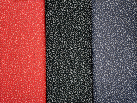 100 percent cotton fabric, hearts and paw prints. Three colors available. Price is per Fat Quarter.