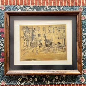 Lionel Barrymore incorniciato scena in oro: cortile di Venezia
