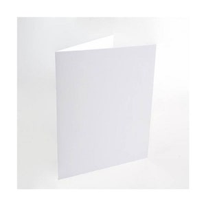 May include: A blank white card folded in half. The card is lying flat on a white surface.