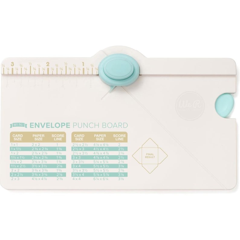 May include: White plastic envelope punch board with a blue handle. The board has a ruler and a chart with different card and paper sizes and score lines. The chart includes the following text: "MINI ENVELOPE PUNCH BOARD".