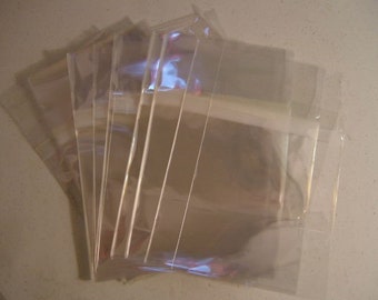 100 sobres de celofán transparentes A6, resellables (4 15/16 x 6 9/16) AE23